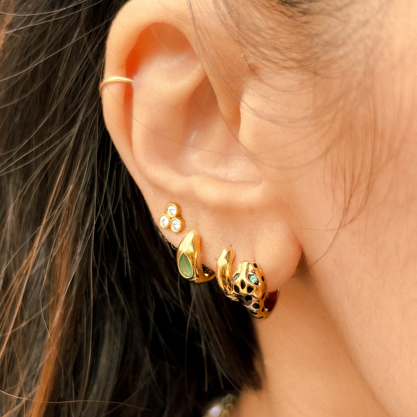 Gold Spotted Jaguar Huggie Earrings with Emerald Eyes